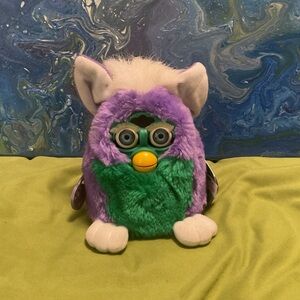 1999 vintage green and purple Furby baby, blue eyes Tiger electronics. Working